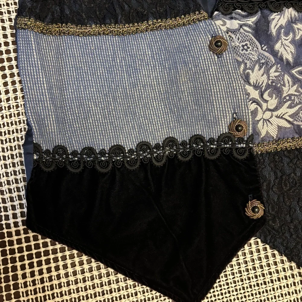 Judy Knapp Vintage vest in various shades of blue by with a printed design SizeS